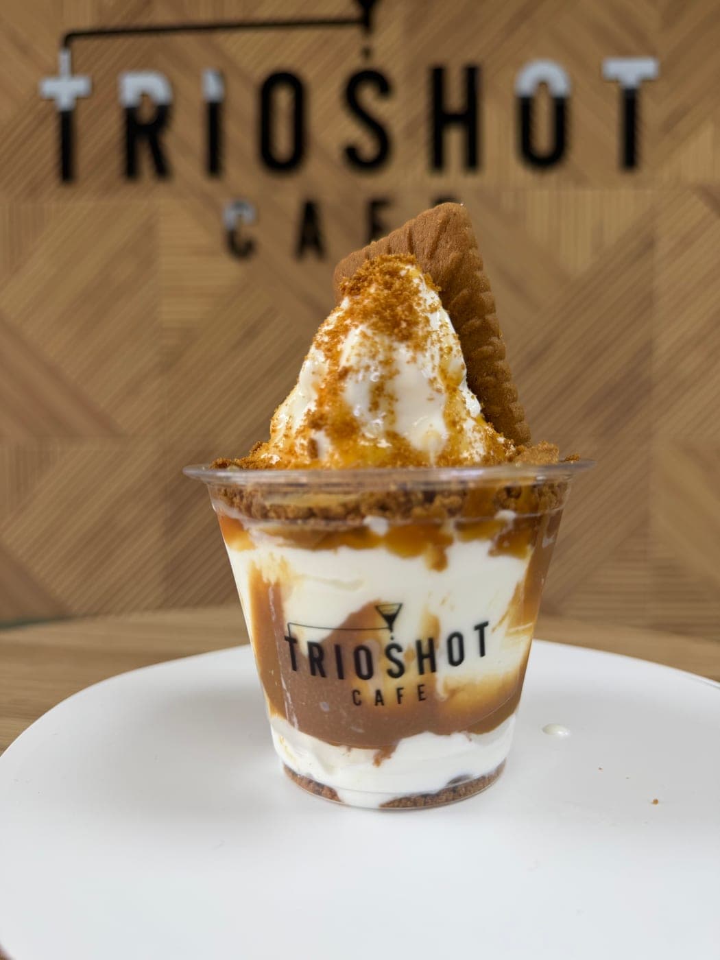 Lotus soft serve cup with caramel and Biscoff crumble